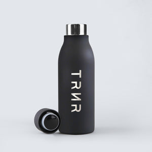 front view of Bliss Bottle in Black with lid off