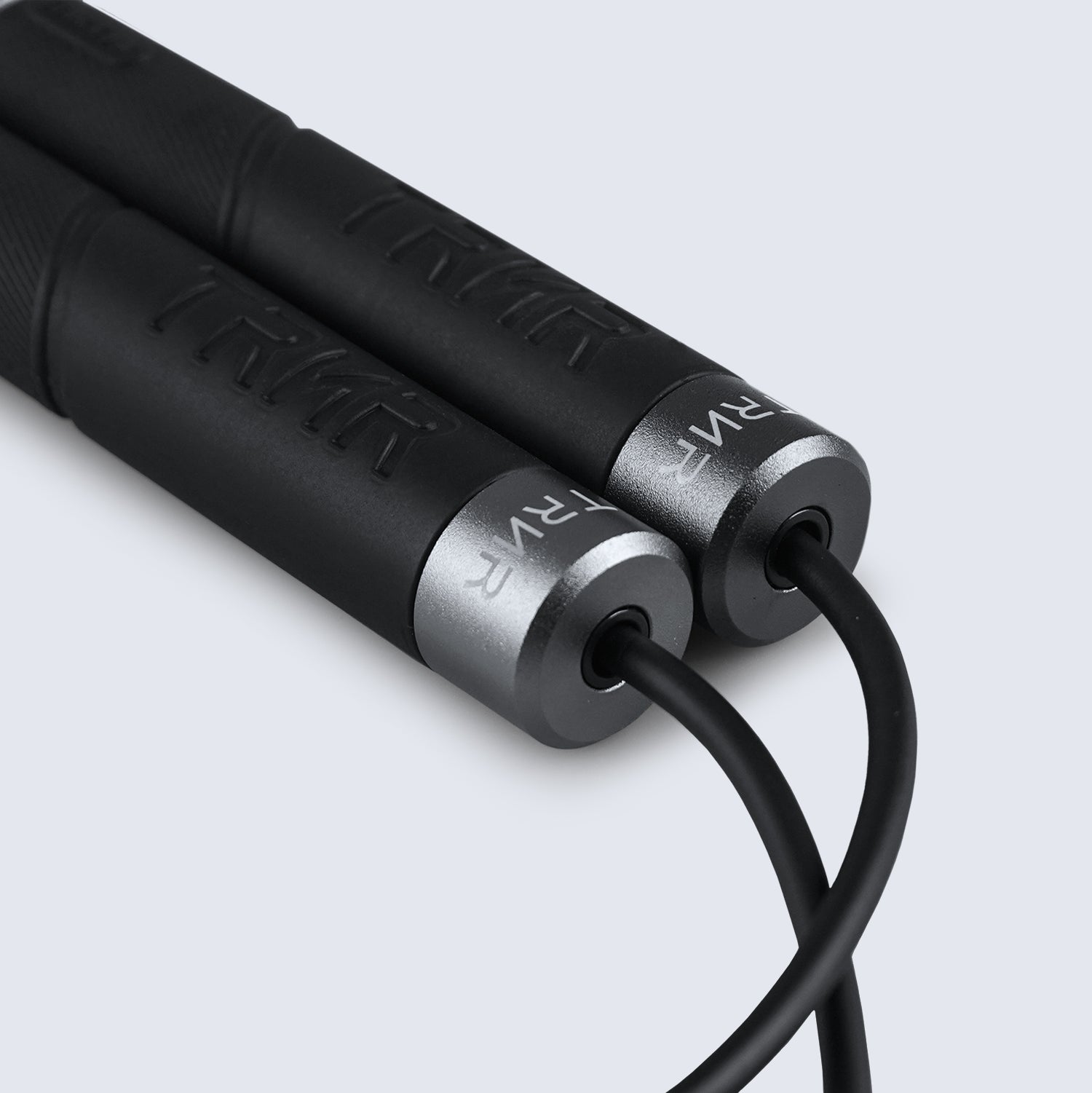 Close up on the non-slip handles of the TRNR Freestyle Skipping Rope 